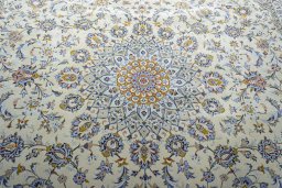 Central medallion detail of 2000s Kashan rug from Iran / Persia