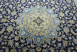 Central medallion detail of 2000s Kashan rug from Iran / Persia