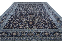 Surface texture of 2000s Kashan rug with natural Wool and intricate pattern