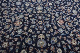 Central medallion detail of 2000s Kashan rug from Iran / Persia