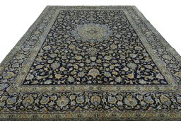 Surface texture of 2000s Kashan rug with natural Wool and intricate pattern