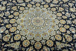Central medallion detail of 2000s Kashan rug from Iran / Persia