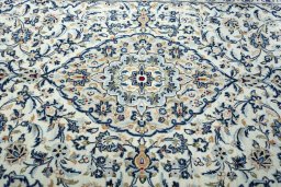 Central medallion detail of 2000s Kashan rug from Iran / Persia