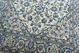 Close-up detail of 2000s Kashan rug from Iran / Persia showing Wool weave