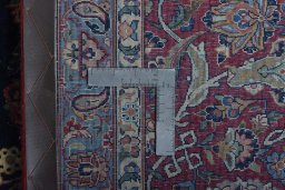 Surface texture of 1930s Kashan rug with natural Wool and intricate pattern