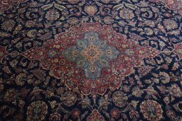 Central medallion detail of 1930s Kashan rug from Iran / Persia