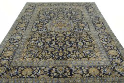 Surface texture of 2000s Kashan rug with natural Wool and intricate pattern
