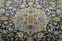 Central medallion detail of 2000s Kashan rug from Iran / Persia