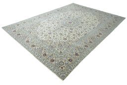 Corner detail of 2000s Kashan rug showing border pattern and Wool pile