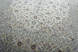 Close-up detail of 2000s Kashan rug from Iran / Persia showing Wool weave