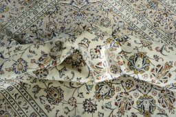 Surface texture of 2000s Kashan rug with natural Wool and intricate pattern