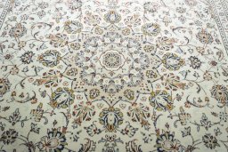 Central medallion detail of 2000s Kashan rug from Iran / Persia