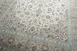 Close-up detail of 2000s Kashan rug from Iran / Persia showing Wool weave