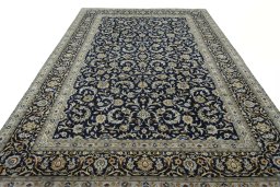 Surface texture of 2000s Kashan rug with natural Wool and intricate pattern