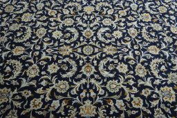 Central medallion detail of 2000s Kashan rug from Iran / Persia