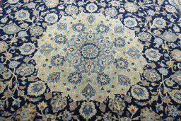 Central medallion detail of 2000s Kashan rug from Iran / Persia