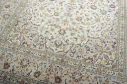 Close-up detail of 2000s Kashan rug from Iran / Persia showing Wool weave
