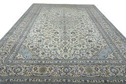 Surface texture of 2000s Kashan rug with natural Wool and intricate pattern