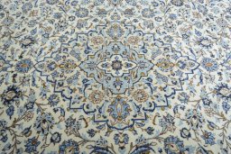 Central medallion detail of 2000s Kashan rug from Iran / Persia