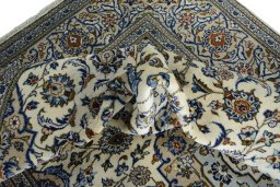 Surface texture of 2000s Kashan rug with natural Wool and intricate pattern