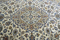 Central medallion detail of 2000s Kashan rug from Iran / Persia