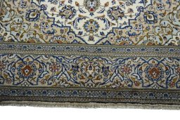 Full view of 2000s Kashan rug from Iran / Persia, 332 × 239 cm in Beige tones