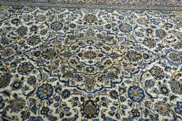 Central medallion detail of 2000s Kashan rug from Iran / Persia
