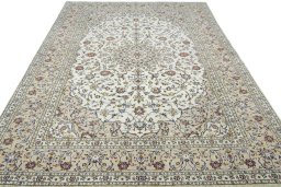 Surface texture of New Kashan rug with natural Wool and intricate pattern