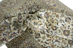 Surface texture of New Kashan rug with natural Wool and intricate pattern