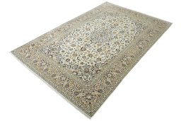 Corner detail of New Kashan rug showing border pattern and Wool pile