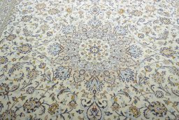 Central medallion detail of 2000s Kashan rug from Iran / Persia
