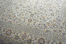 Close-up detail of 2000s Kashan rug from Iran / Persia showing Wool weave