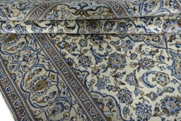 Close-up detail of 2000s Kashan rug from Iran / Persia showing Wool weave