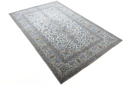 Close-up detail of 2000s Kashan rug from Iran / Persia showing Wool weave