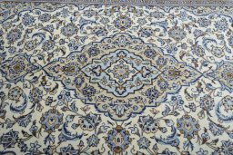 Central medallion detail of 2000s Kashan rug from Iran / Persia