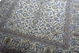 Close-up detail of 2000s Kashan rug from Iran / Persia showing Wool weave