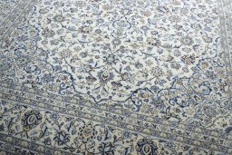 Close-up detail of 2000s Kashan rug from Iran / Persia showing Wool weave