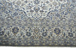 Full view of 2000s Kashan rug from Iran / Persia, 397 × 297 cm in Beige tones