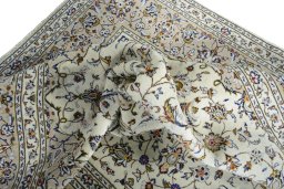 Surface texture of 2000s Kashan rug with natural Wool and intricate pattern