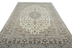 Surface texture of 2000s Kashan rug with natural Wool and intricate pattern