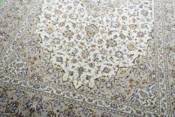 Close-up detail of 2000s Kashan rug from Iran / Persia showing Wool weave