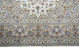 Full view of 2000s Kashan rug from Iran / Persia, 301 × 202 cm in Beige tones