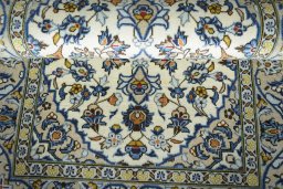 Close-up detail of 2000s Kashan rug from Iran / Persia showing Wool weave