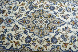 Central medallion detail of 2000s Kashan rug from Iran / Persia