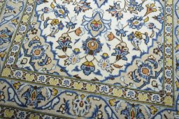 Close-up detail of 2000s Kashan rug from Iran / Persia showing Wool weave