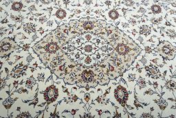 Central medallion detail of 2000s Kashan rug from Iran / Persia