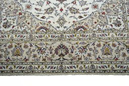 Full view of 2000s Kashan rug from Iran / Persia, 301 × 207 cm in Beige tones