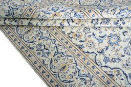 Close-up detail of 2000s Kashan rug from Iran / Persia showing Wool weave