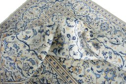 Surface texture of 2000s Kashan rug with natural Wool and intricate pattern