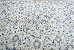 Central medallion detail of 2000s Kashan rug from Iran / Persia